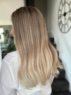 Diana  18 inch long remy human hair wig featuring naturlal looking lace front and multi directional parting lace top. Ombre blond colour.