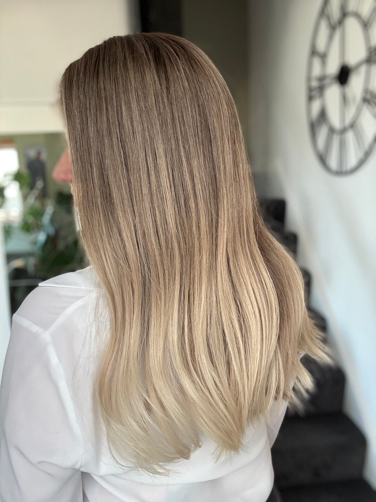 Diana  18 inch long remy human hair wig featuring naturlal looking lace front and multi directional parting lace top. Ombre blond colour.